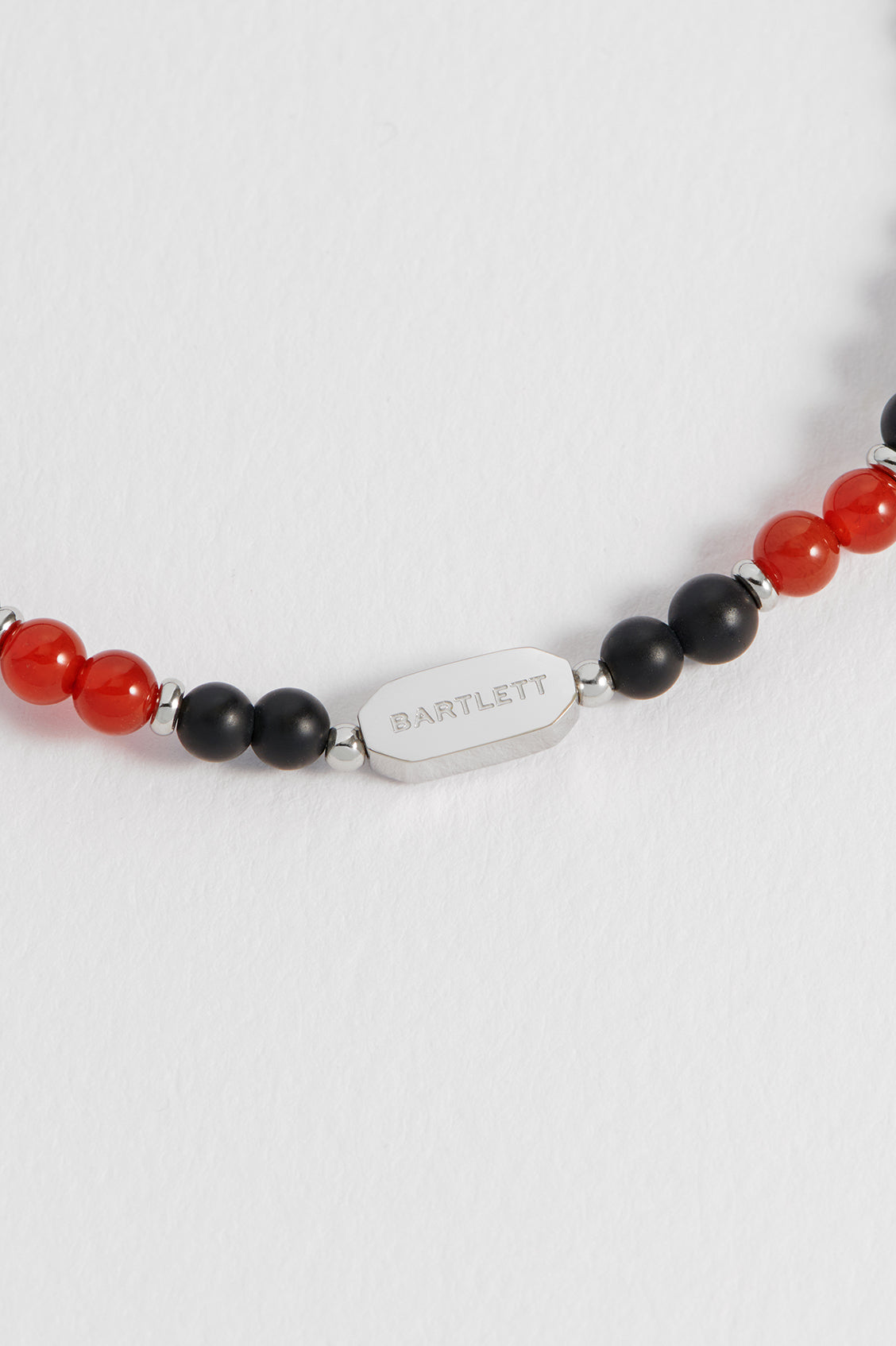 Men's Black Onyx Bracelet With Red Agate Accent