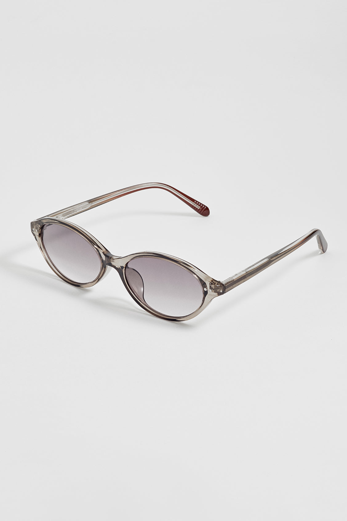 Jakarta Transparent Grey Oval Women’s Sunglasses