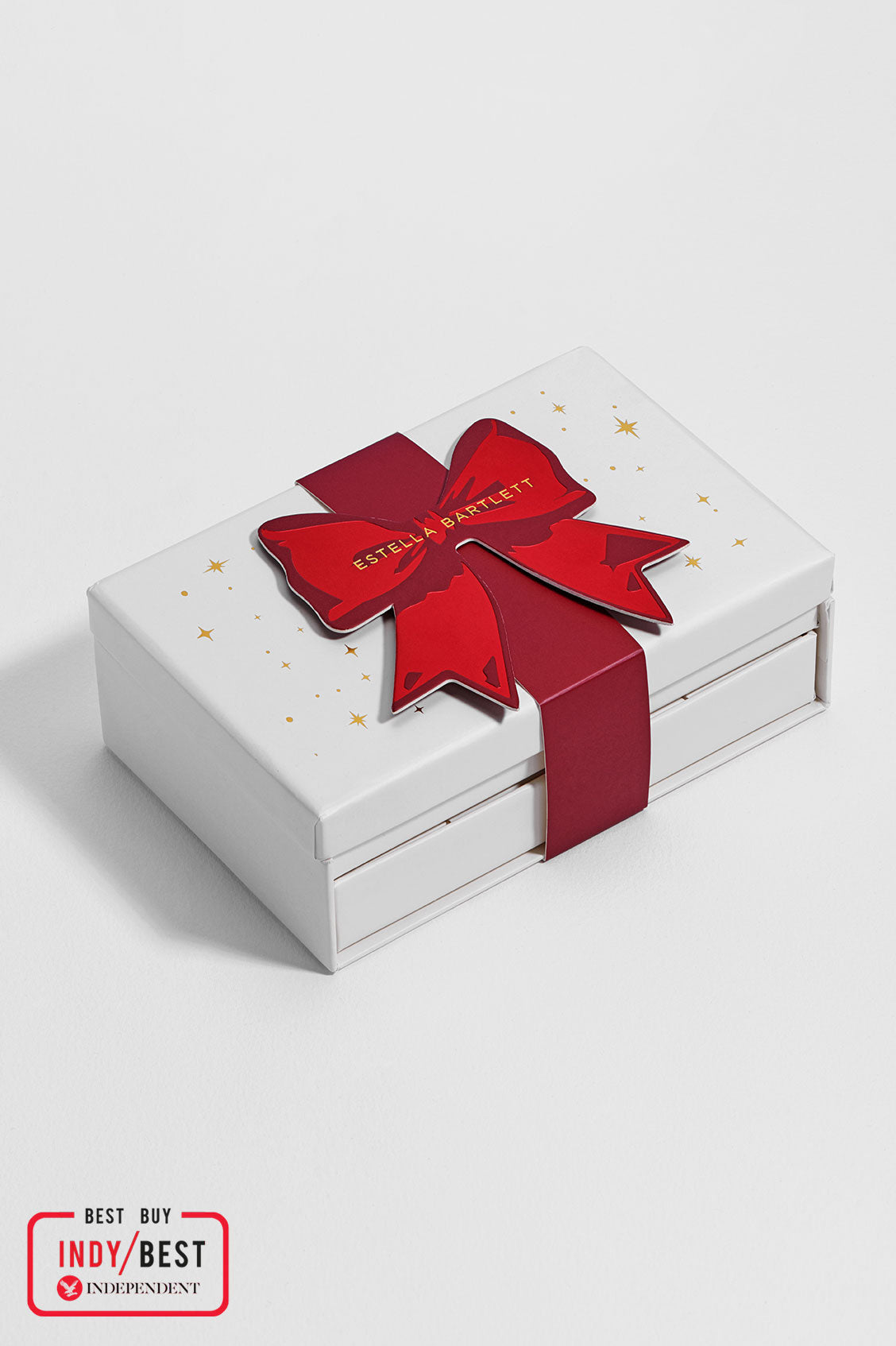 White jewelry box with a red bow and 'Everly & Harlow' branding on a white background.