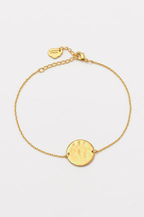 estella bartlett Hammered Disc Bracelet Gold Plated Packaging Message: All You Need Is Love Top Sellers | Jewelry
